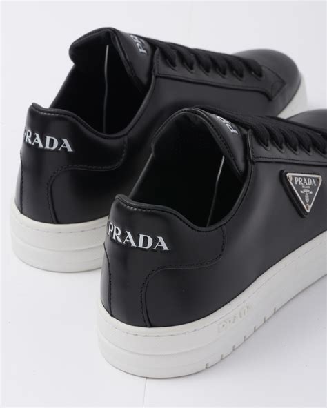 black and white prada sneakers.